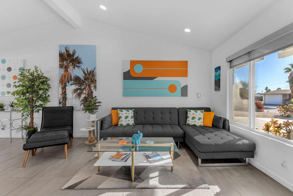 2304 East Bellamy Road Palm Springs, CA 92262 - Photo 12 of 32 a living room with furniture and a potted plant