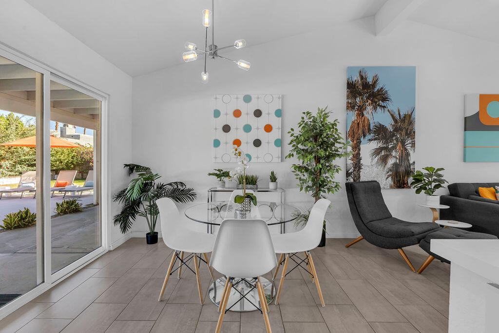 2304 East Bellamy Road Palm Springs, CA 92262 - Photo 14 of 32 a view of a livingroom with furniture and a potted plant