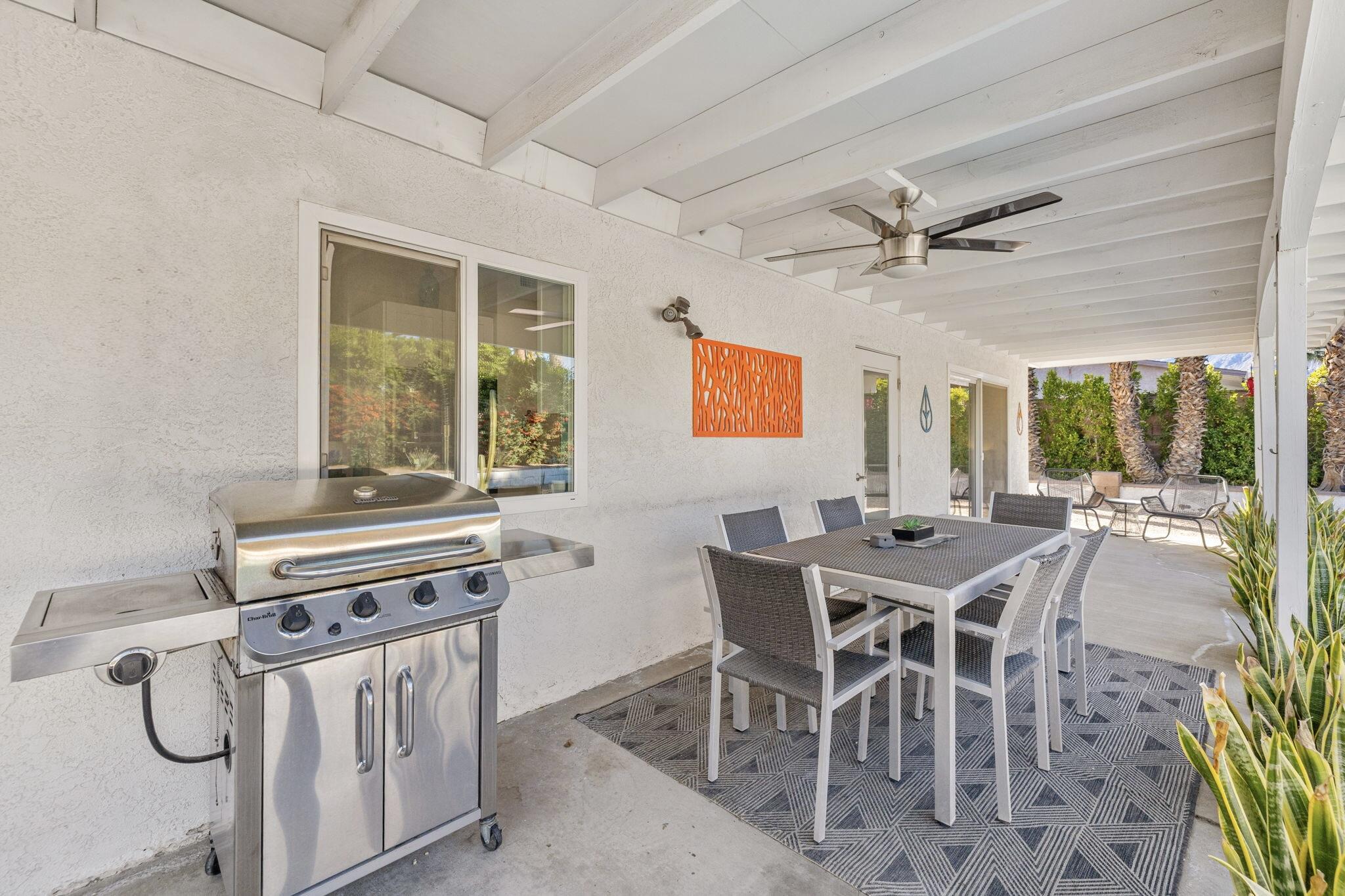 2304 East Bellamy Road Palm Springs, CA 92262 - Photo 5 of 32 a view of a dining room with furniture window and outside view