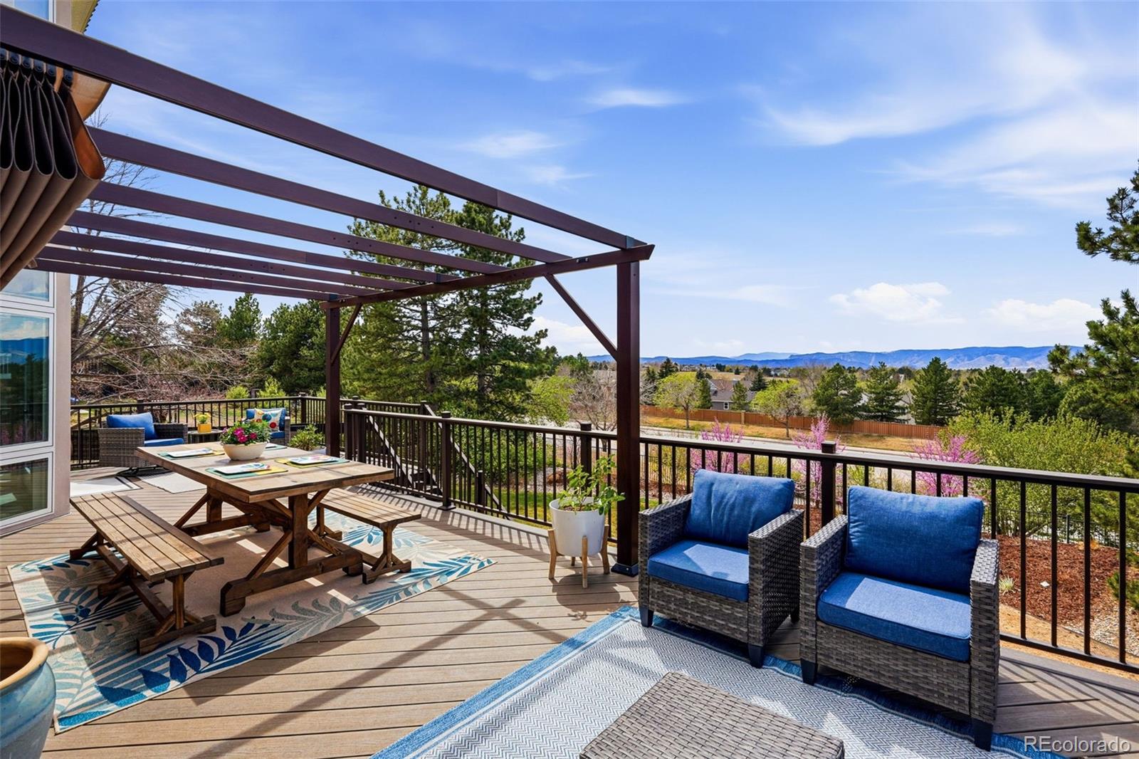 77 Falcon Hills Drive Highlands Ranch, CO 80126 - Photo 27 of 43 a view of a chairs in the roof deck