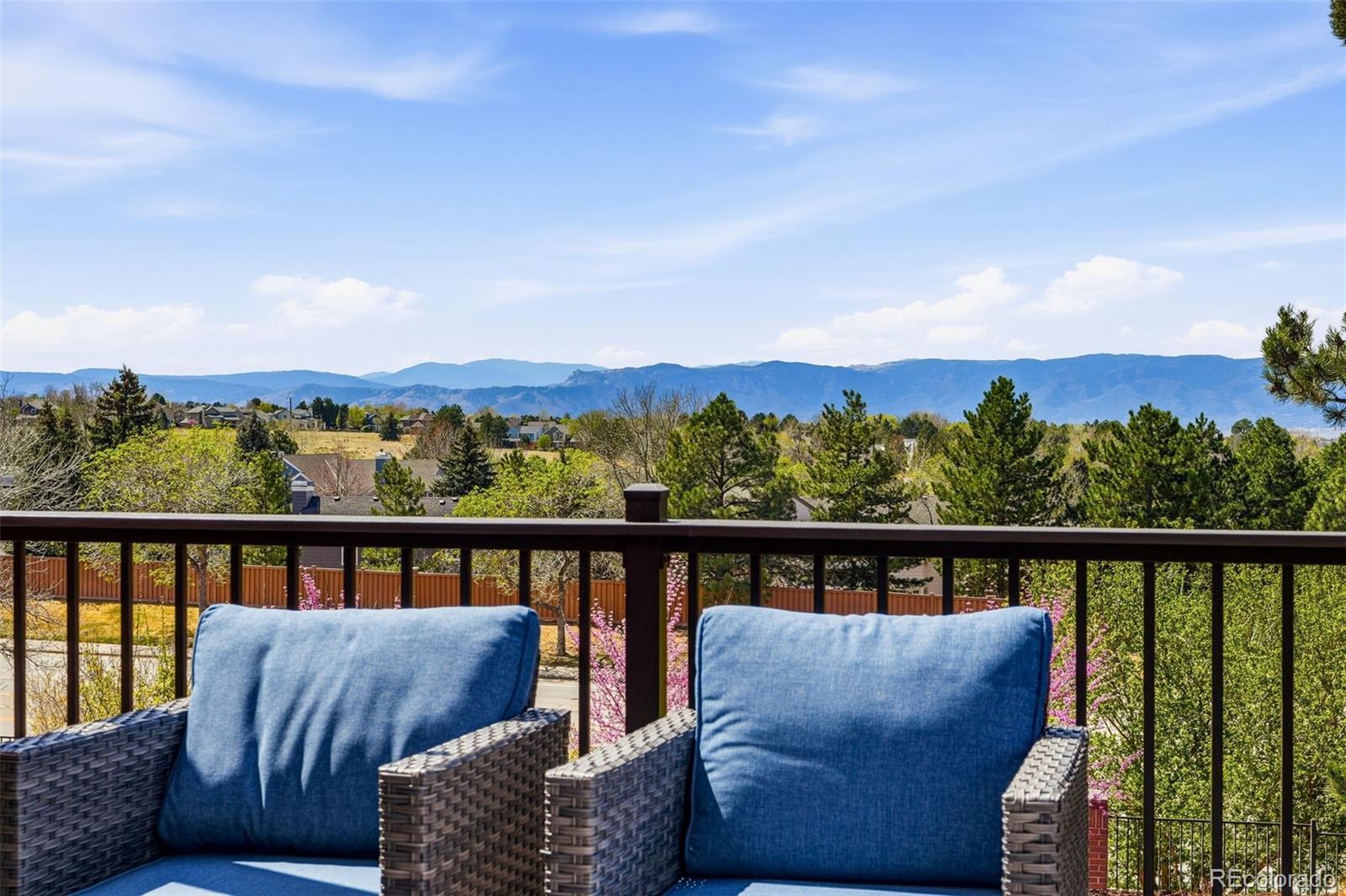 77 Falcon Hills Drive Highlands Ranch, CO 80126 - Photo 29 of 43 a view of city from balcony with furniture