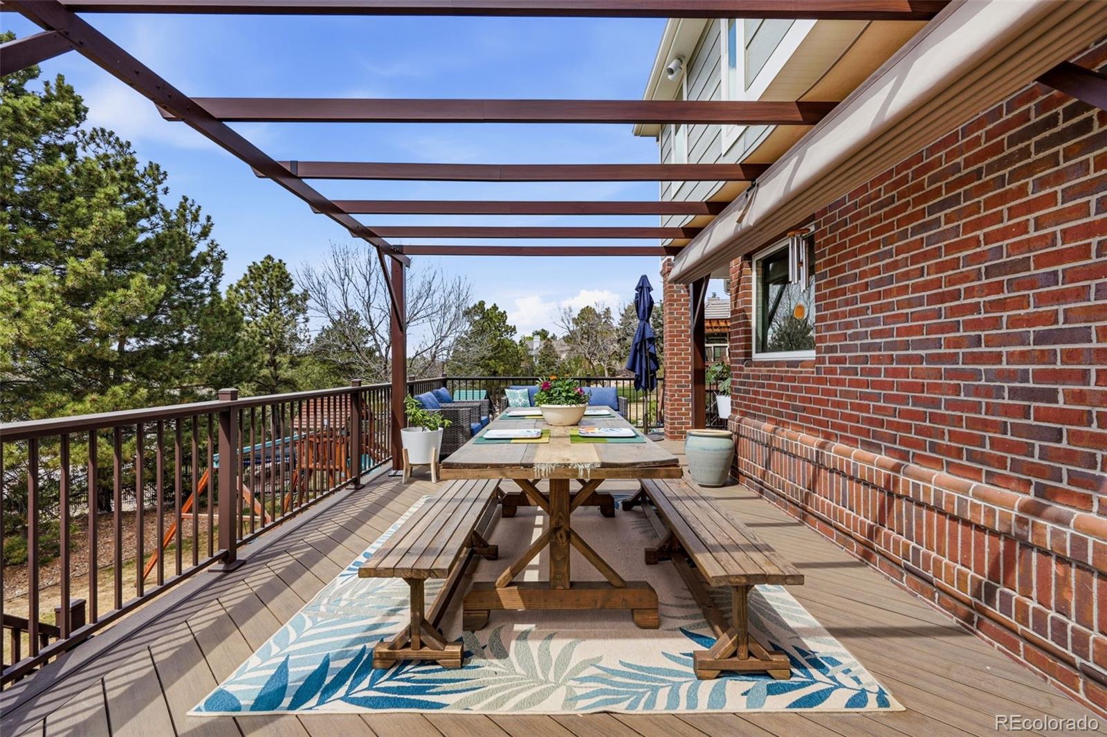 77 Falcon Hills Drive Highlands Ranch, CO 80126 - Photo 31 of 43 a view of balcony with furniture