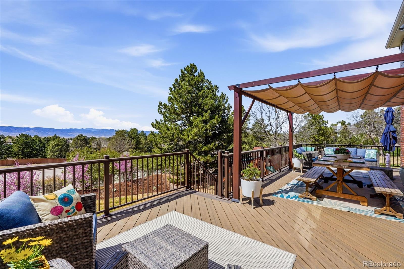 77 Falcon Hills Drive Highlands Ranch, CO 80126 - Photo 32 of 43 a view of a balcony with furniture