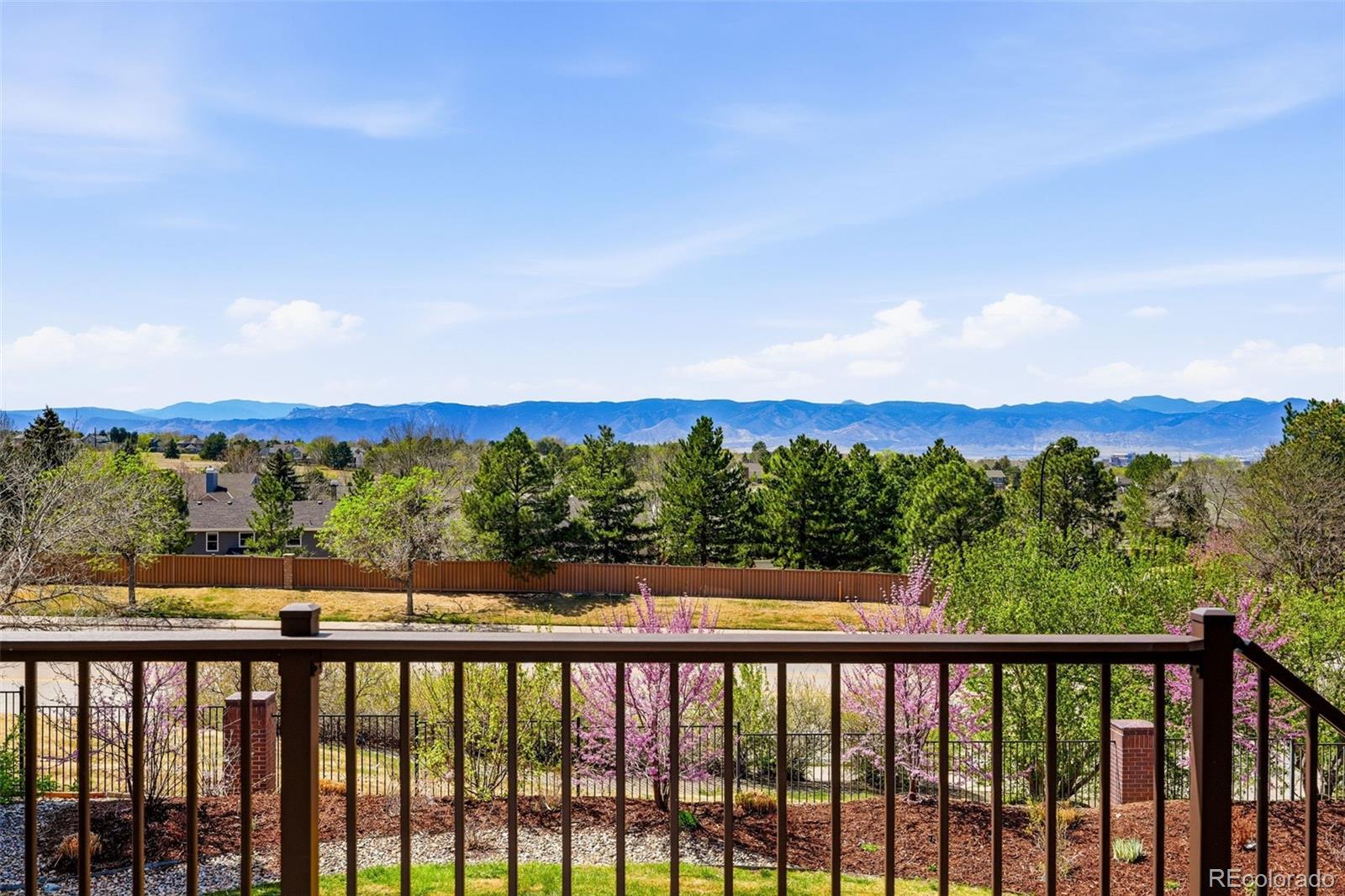 77 Falcon Hills Drive Highlands Ranch, CO 80126 - Photo 33 of 43 a view of a balcony with mountain view