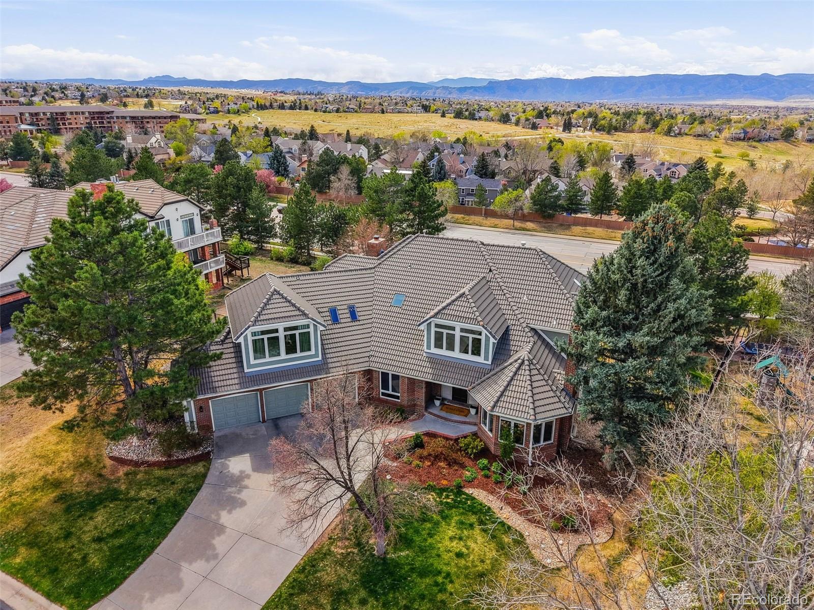 77 Falcon Hills Drive Highlands Ranch, CO 80126 - Photo 40 of 43 an aerial view of a house with a outdoor space