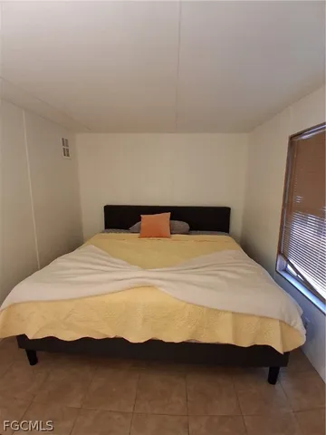 a backyard of a house with a trees