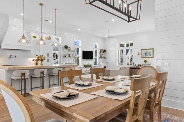 a stove top oven sitting inside of a kitchen