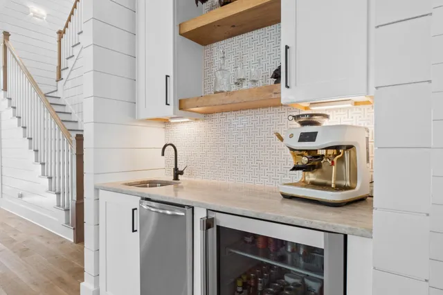a view of a kitchen and dining room