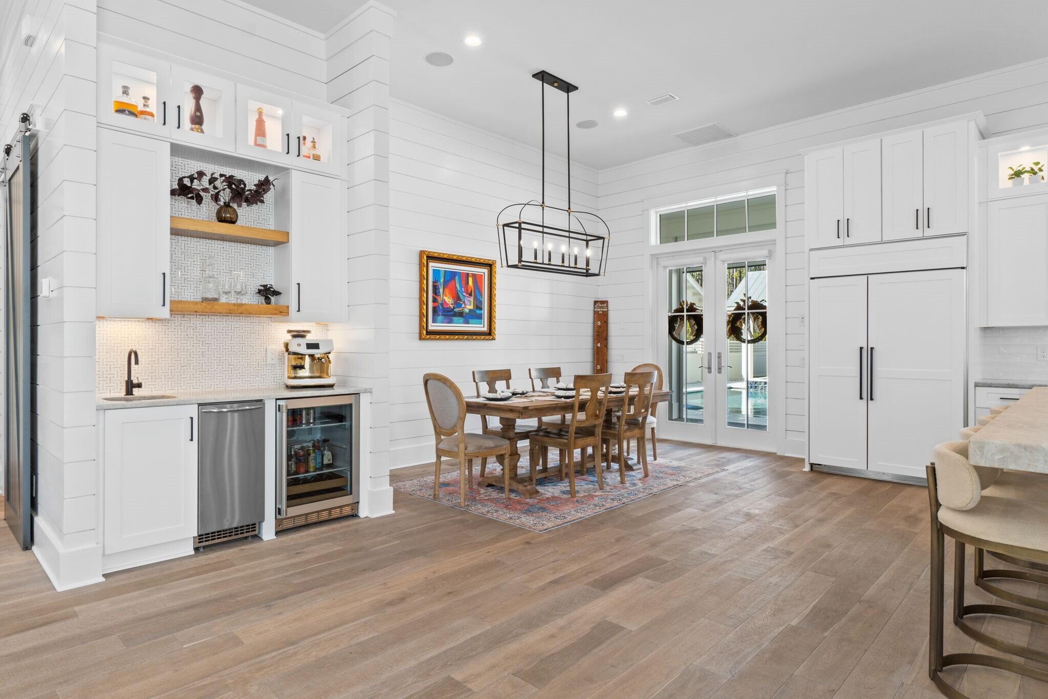 92 Rosecourt Street Inlet Beach, FL 32461 - Photo 16 of 65 a view of a kitchen and dining room