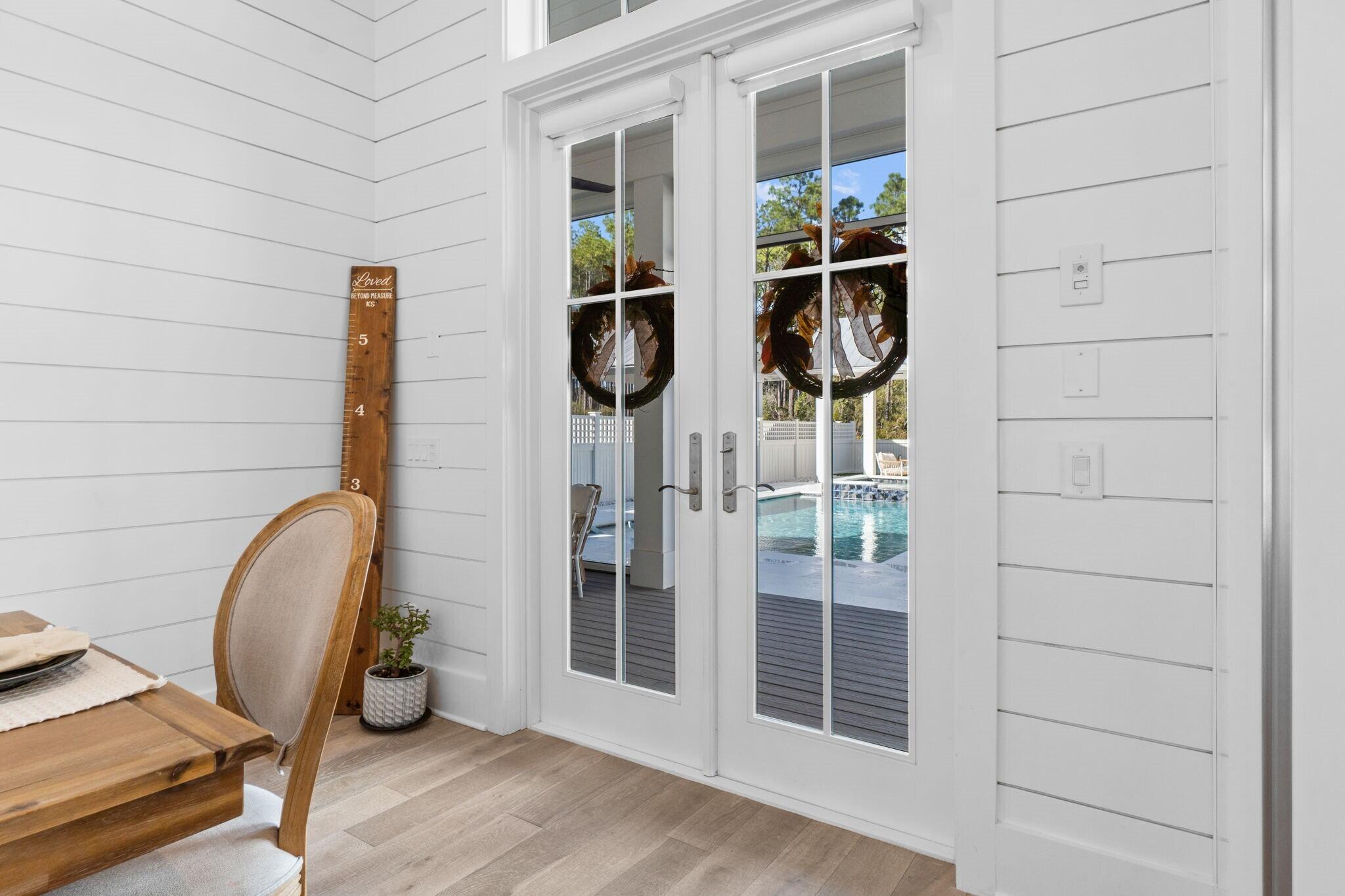 92 Rosecourt Street Inlet Beach, FL 32461 - Photo 17 of 65 a front view of a house with patio