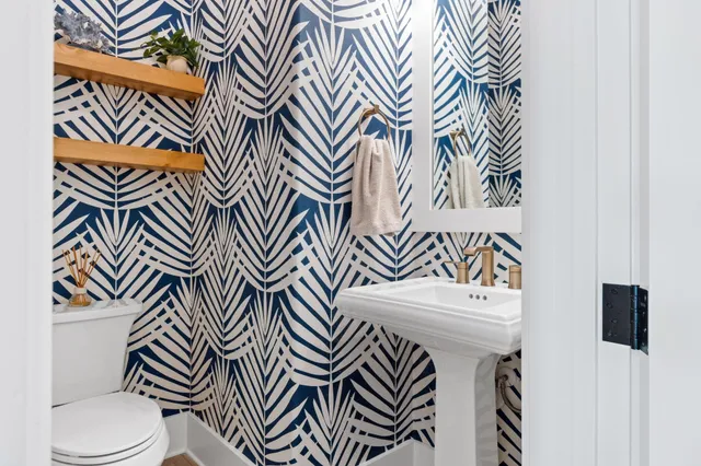 a view of kitchen cabinets and refrigerator