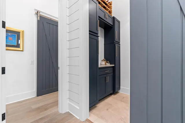 a spacious bedroom with a bed and a window