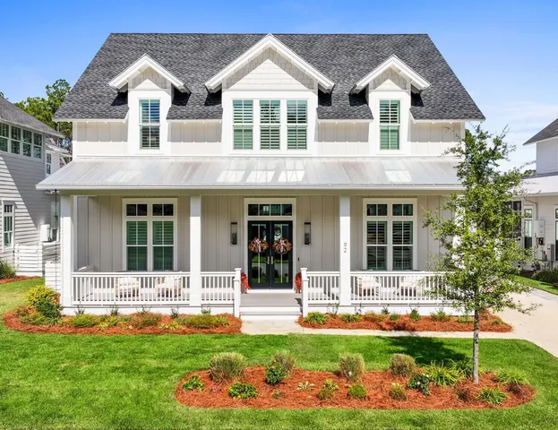 front view of a house with a yard