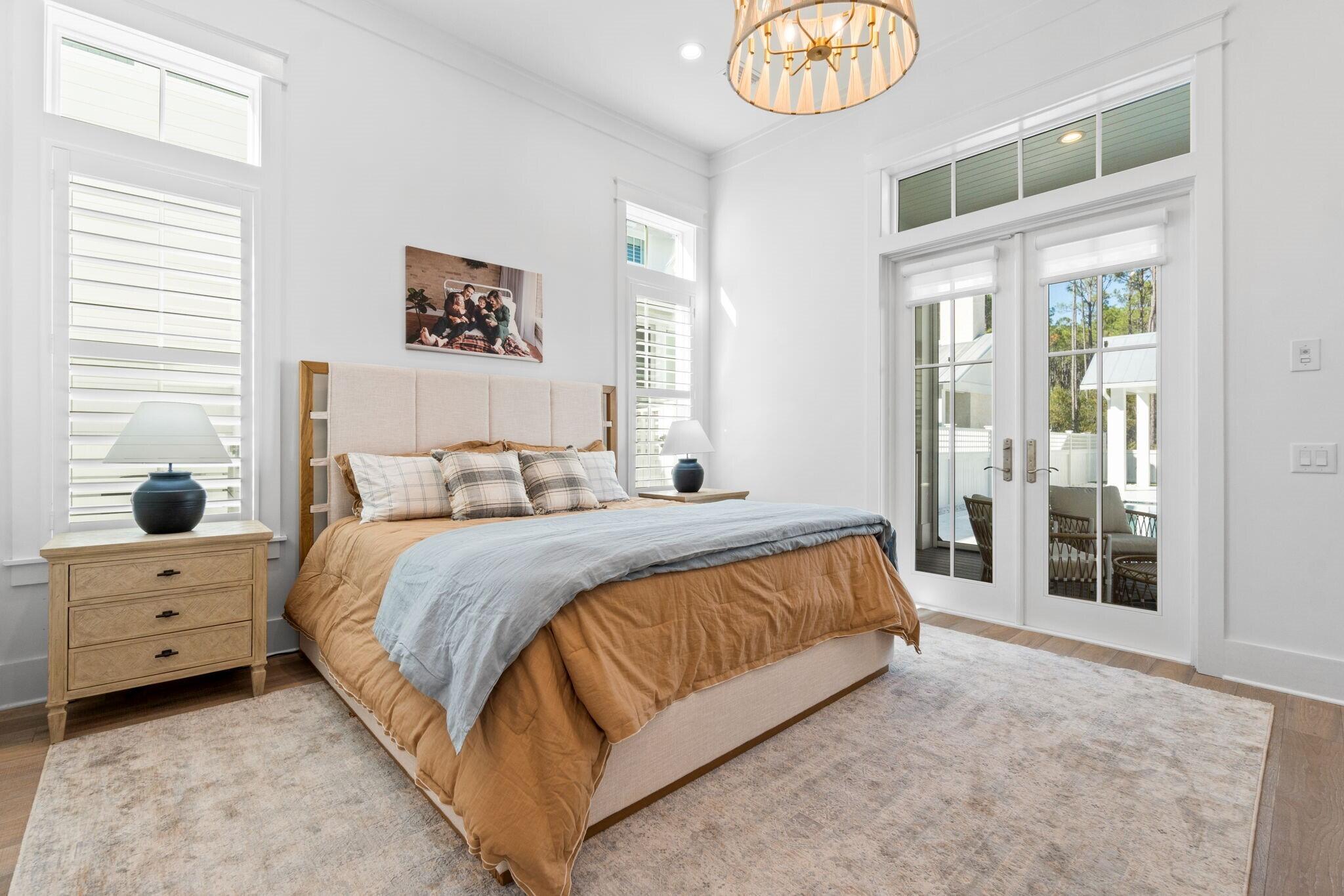 92 Rosecourt Street Inlet Beach, FL 32461 - Photo 21 of 65 a bedroom with a bed and a large window