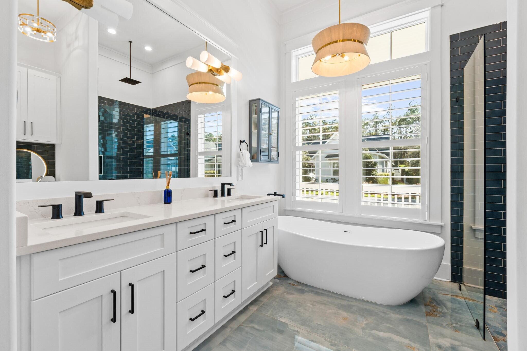 92 Rosecourt Street Inlet Beach, FL 32461 - Photo 24 of 65 a bathroom with a large tub sink and double vanity
