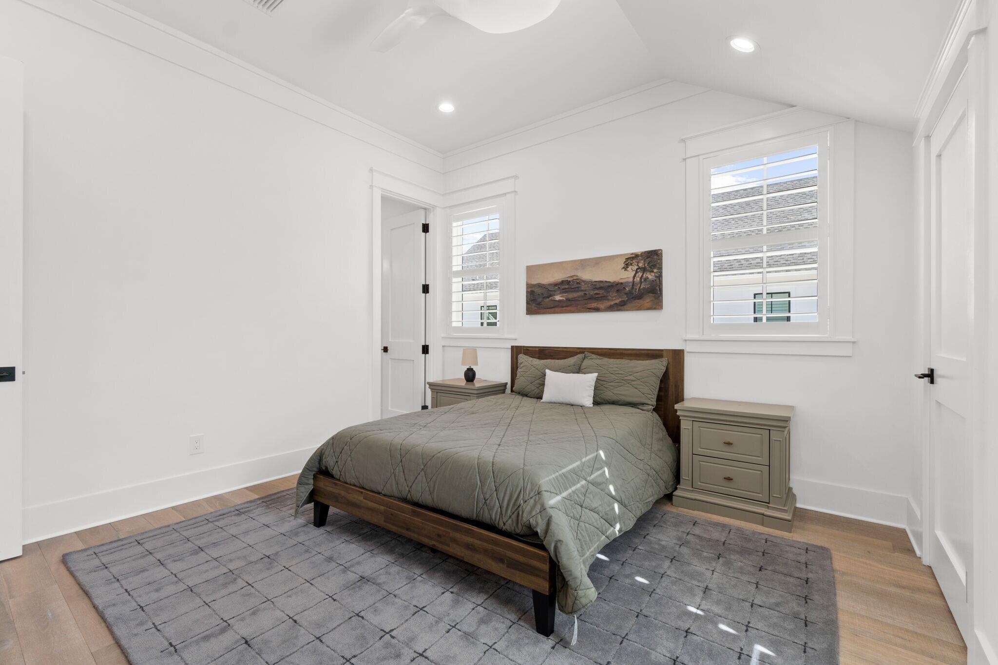 92 Rosecourt Street Inlet Beach, FL 32461 - Photo 33 of 65 a bedroom with a bed and a window