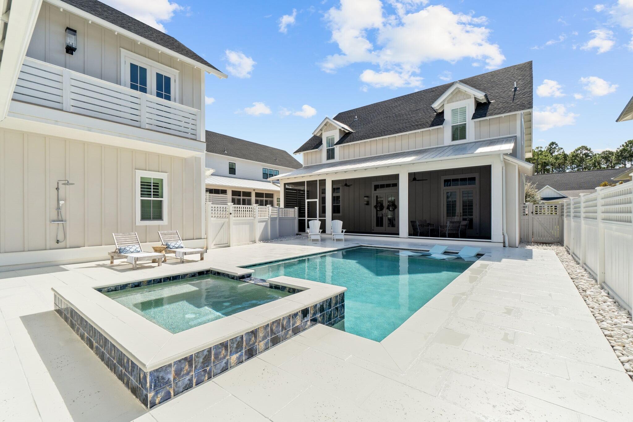 92 Rosecourt Street Inlet Beach, FL 32461 - Photo 46 of 65 a view of a house with backyard and porch