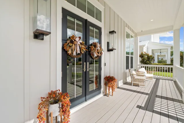 a view of a balcony with wooden floor
