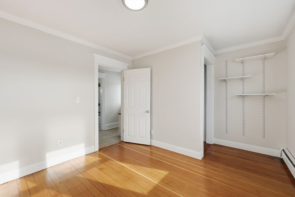 2 Cycle Street Westfield, MA 01085 - Photo 20 of 30 a view of an empty room with wooden floor and closet