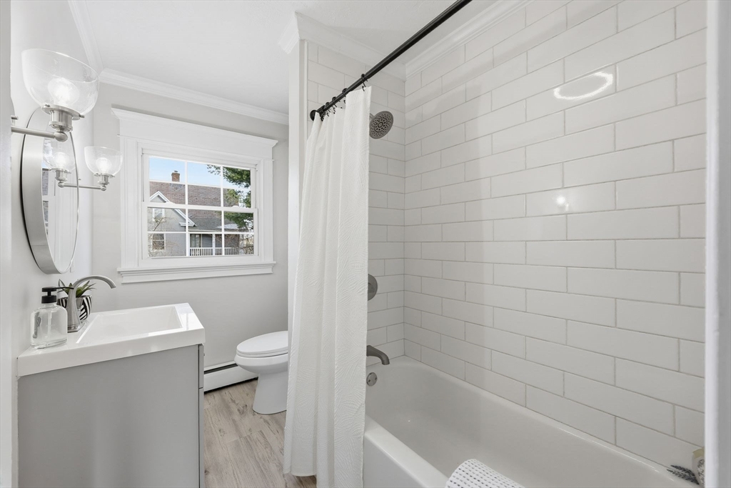 2 Cycle Street Westfield, MA 01085 - Photo 21 of 30 a bathroom with a bathtub shower sink vanity and a toilet