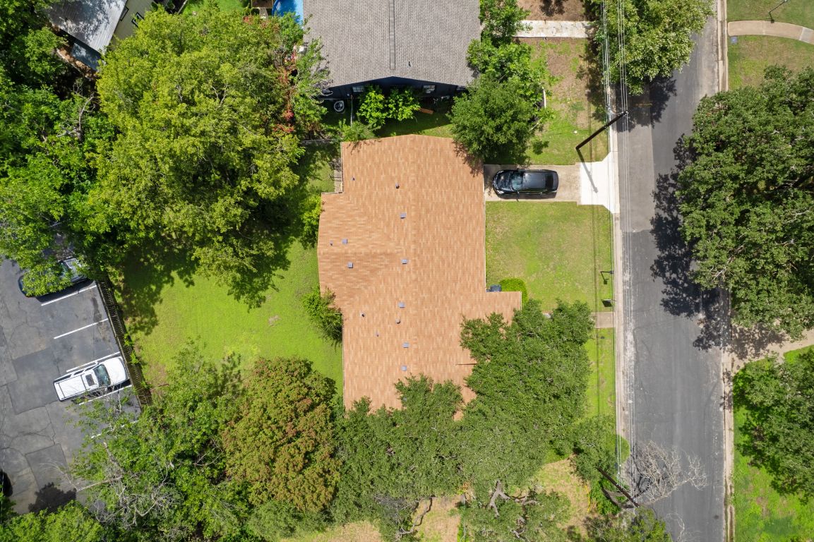 1719 East 32nd Street Austin, TX 78722 - Photo 13 of 13 an aerial view of residential house with outdoor space and trees all around