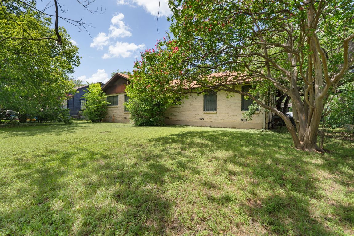 1719 East 32nd Street Austin, TX 78722 - Photo 5 of 13 a view of a house with yard and a tree