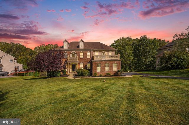 a view of a large building with a big yard