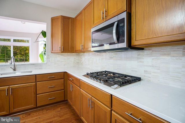 a bathroom with a sink and vanity