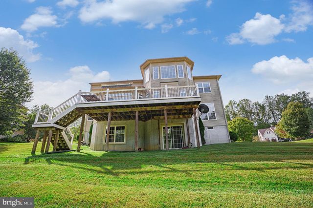 a picture of a bathroom with a shower