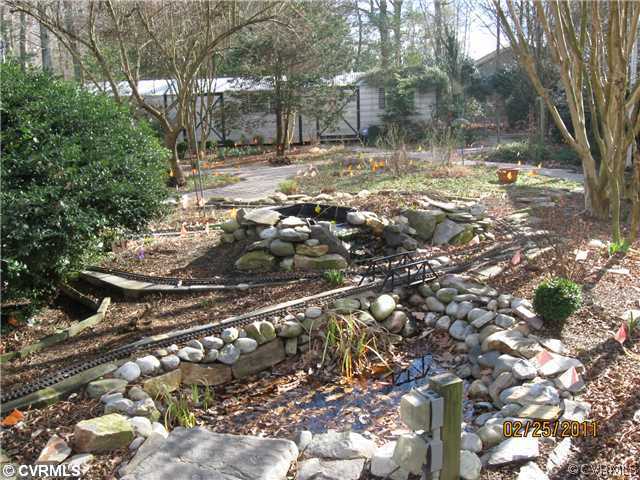2501 Juniper Road Prince George, VA 23875 - Photo 6 of 8 Yard/Garden - Koi Pond with miniature train tracks