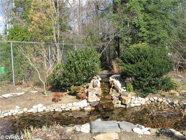 2501 Juniper Road Prince George, VA 23875 - Photo 7 of 8 Yard/Garden - Koi pond with waterfall