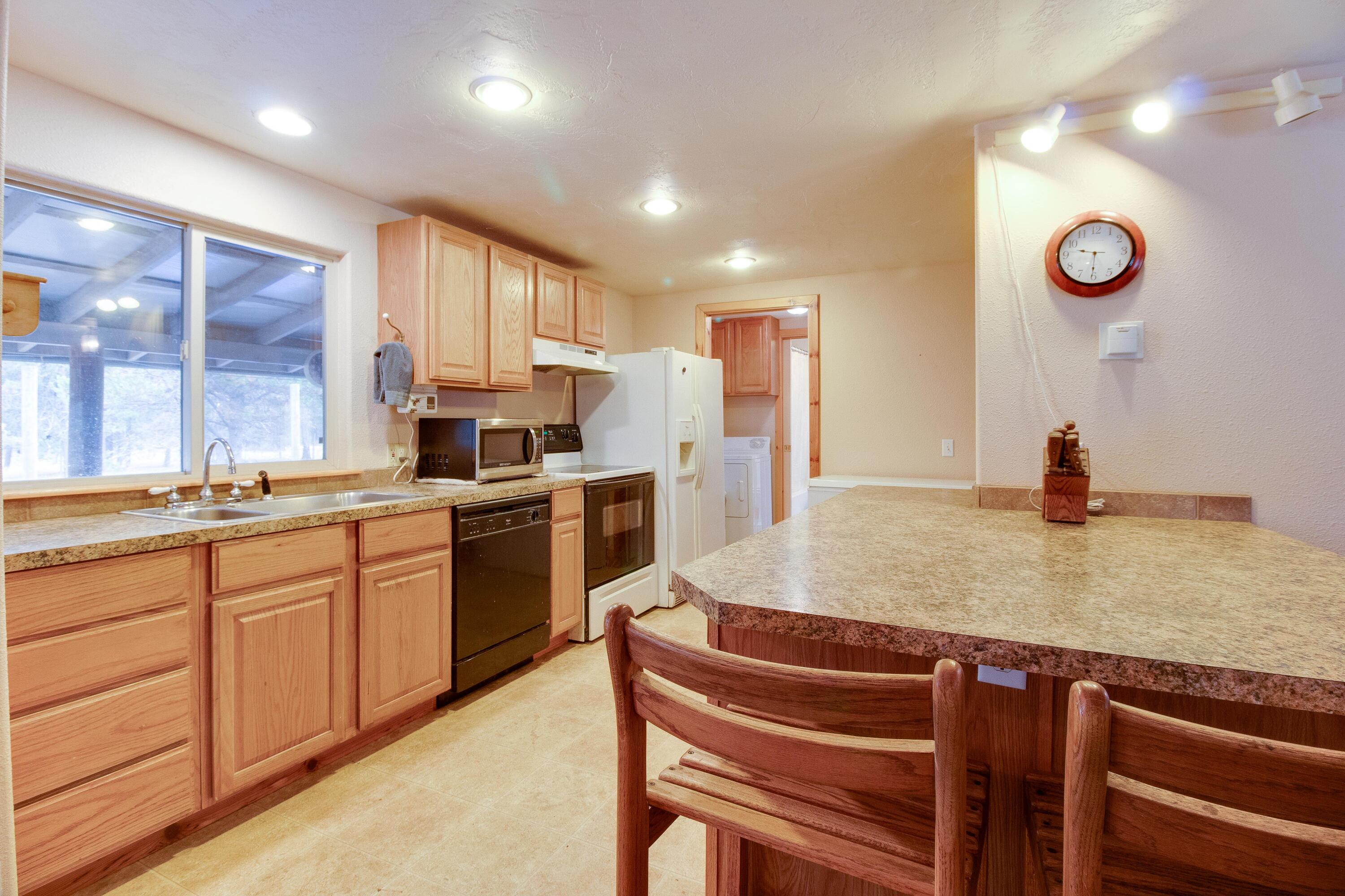 52645 Ranch Drive La Pine, OR 97739 - Photo 13 of 38 Kitchen Looking through to Laundry Room