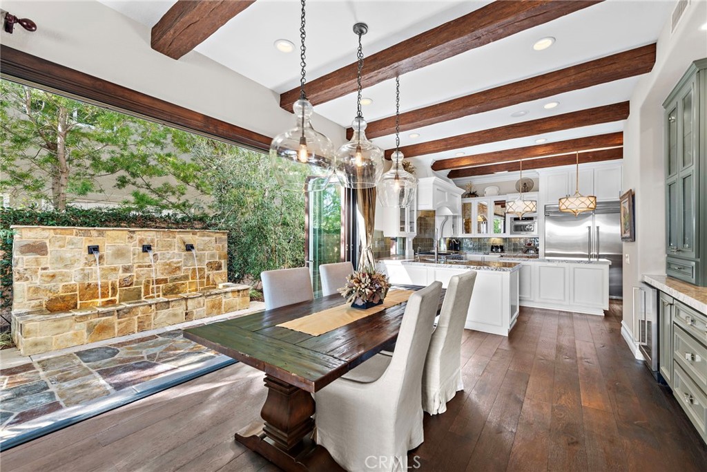 18651 Topanga Canyon Road Silverado, CA 92676 - Photo 14 of 55 a view of a dining room with furniture window and wooden floor