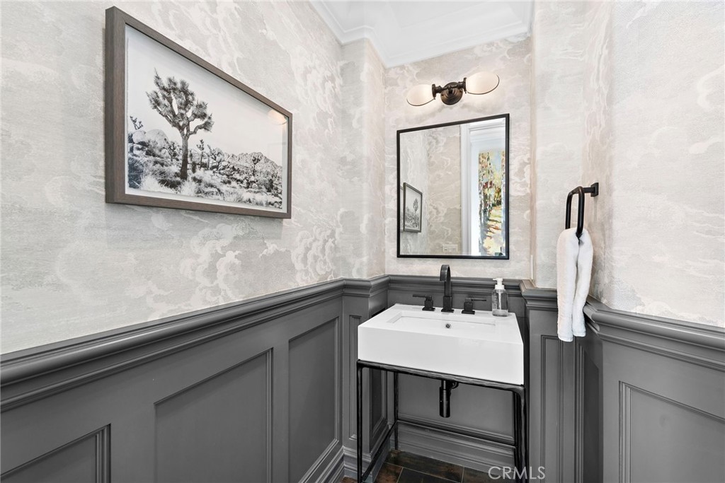 18651 Topanga Canyon Road Silverado, CA 92676 - Photo 20 of 55 a bathroom with a sink and a mirror