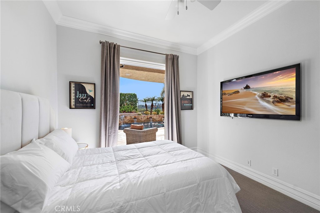 18651 Topanga Canyon Road Silverado, CA 92676 - Photo 21 of 55 a bed sitting in a bedroom next to a window