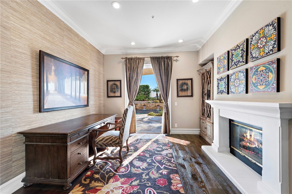 18651 Topanga Canyon Road Silverado, CA 92676 - Photo 23 of 55 a living room with furniture fireplace and flat screen tv