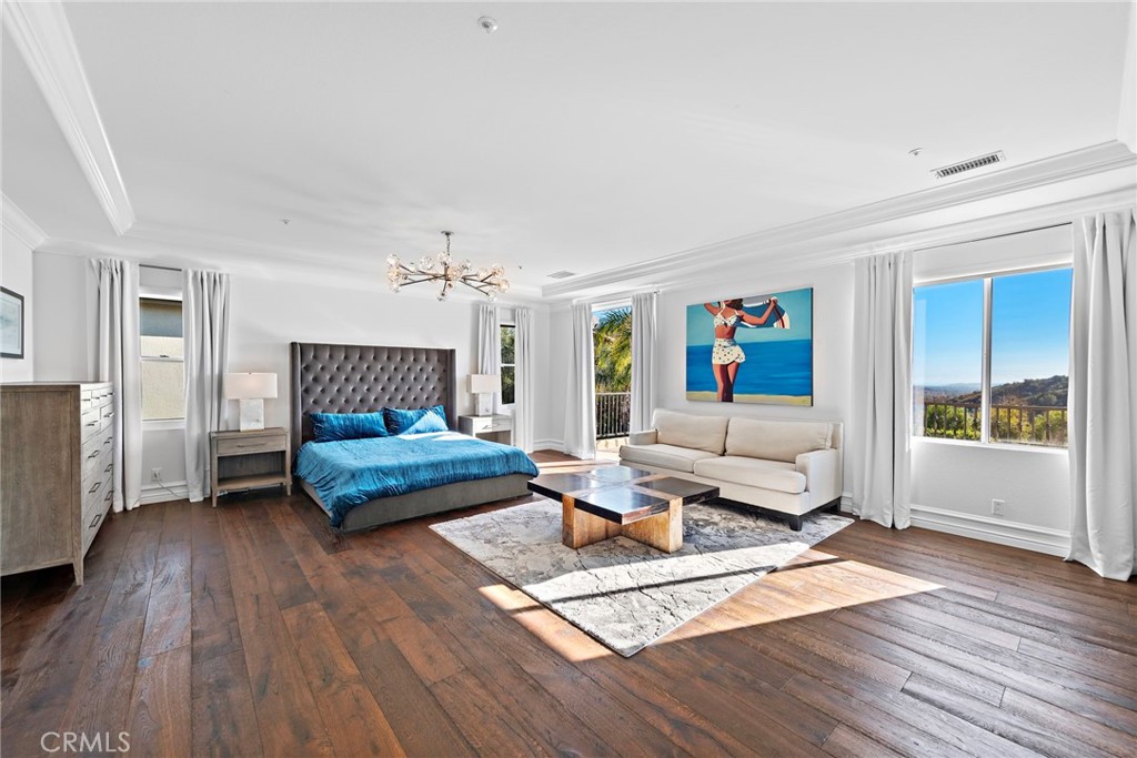 18651 Topanga Canyon Road Silverado, CA 92676 - Photo 25 of 55 a living room with furniture and a wooden floor