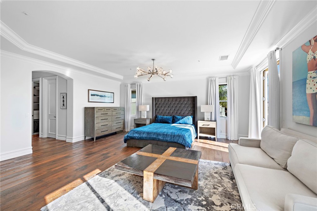 18651 Topanga Canyon Road Silverado, CA 92676 - Photo 26 of 55 a living room with furniture a fireplace and a chandelier