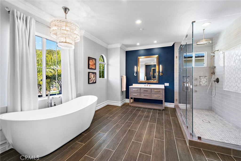 18651 Topanga Canyon Road Silverado, CA 92676 - Photo 30 of 55 a living room with a bed and a chandelier