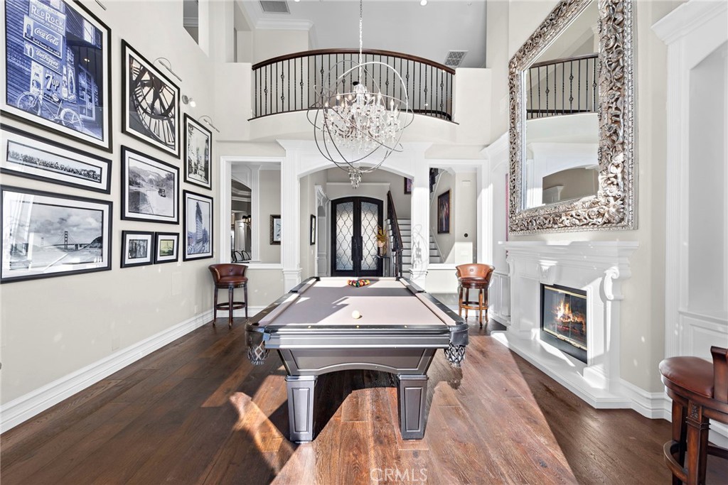 18651 Topanga Canyon Road Silverado, CA 92676 - Photo 4 of 55 a view of living room kitchen with furniture and fireplace