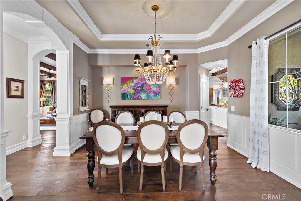 18651 Topanga Canyon Road Silverado, CA 92676 - Photo 7 of 55 a view of a dining room with furniture and wooden floor
