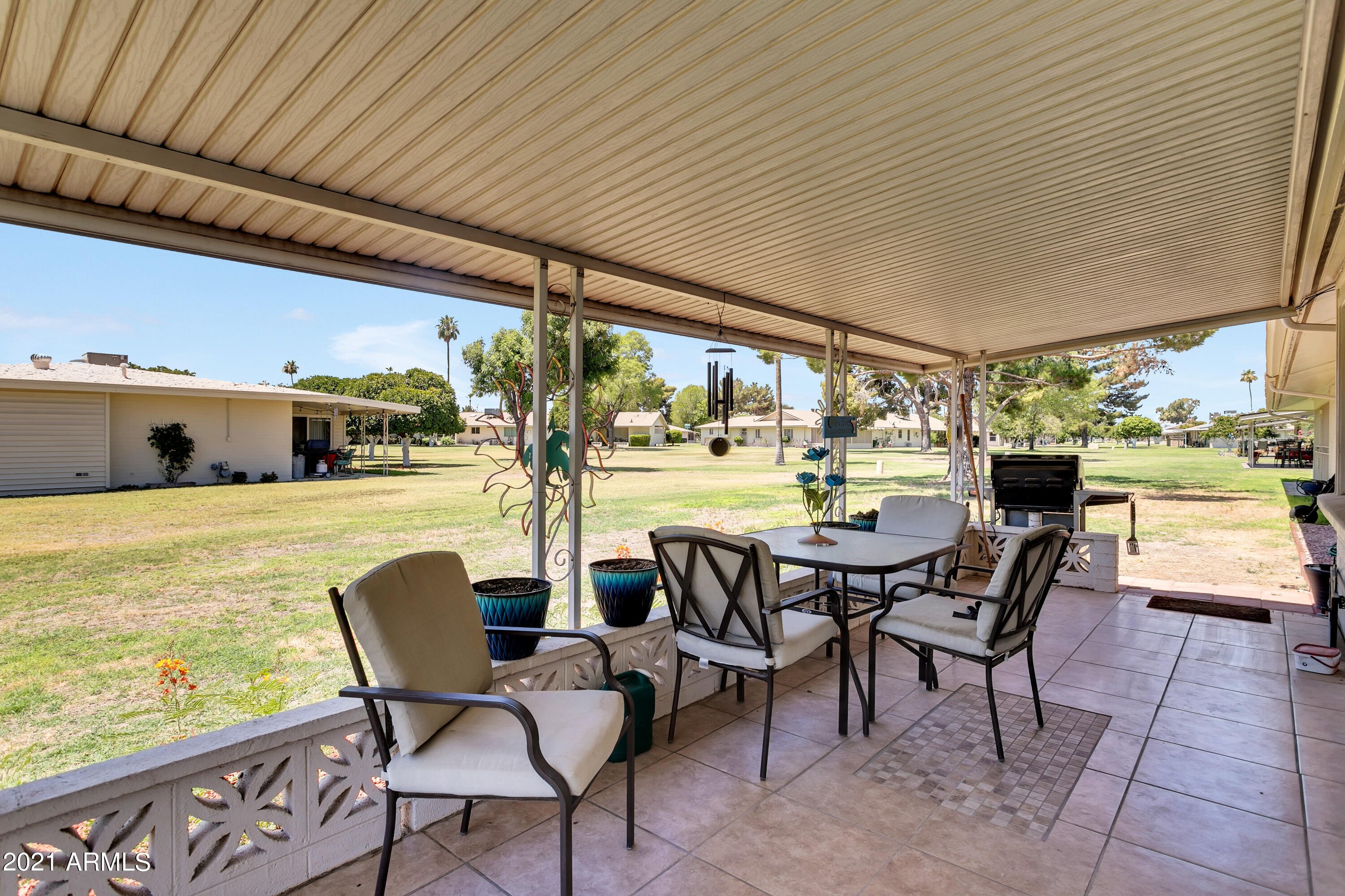 10701 West Hatcher Road Sun City, AZ 85351 - Photo 30 of 32 Peaceful Covered Patio