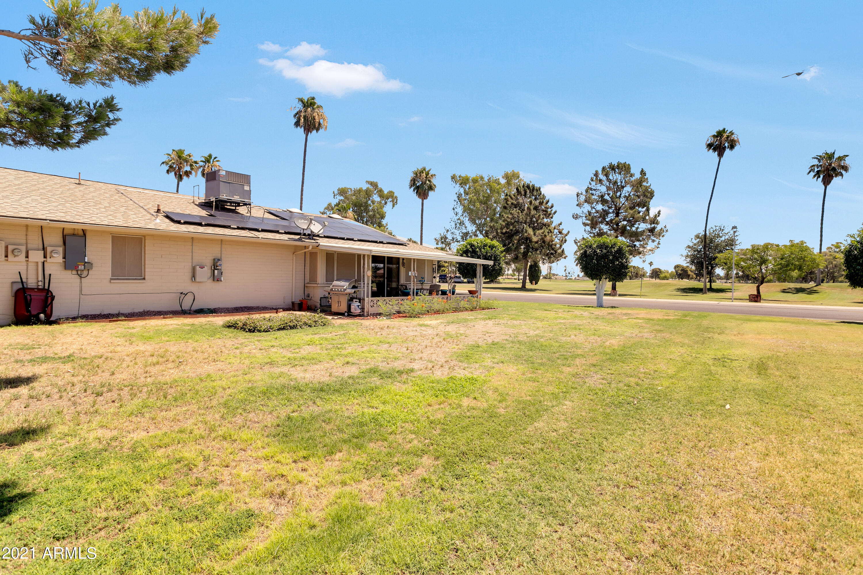 10701 West Hatcher Road Sun City, AZ 85351 - Photo 31 of 32 Patio looks towards Golf Course