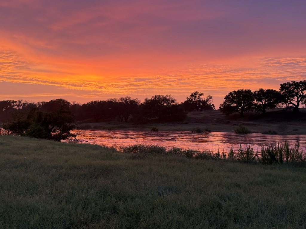 385 Ranch Road 1 Stonewall, TX 78671 - Photo 14 of 20 a view of sunset and lake