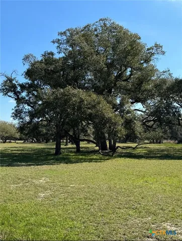 a view of outdoor space with deck and green space