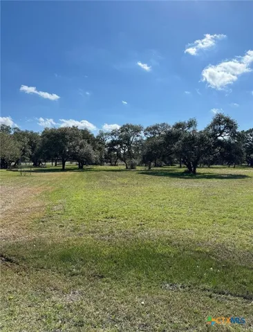a view of a lake with a city
