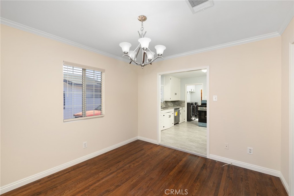 3920 Elma Road Pasadena, CA 91107 - Photo 12 of 29 a view of a livingroom with a chandelier