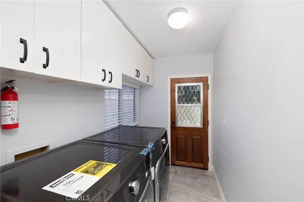 a view of kitchen and utility room