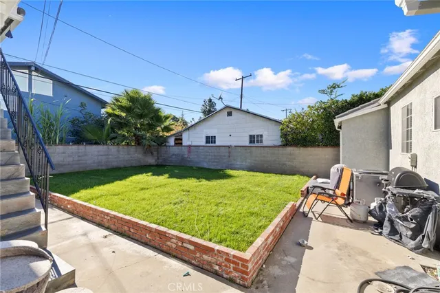 a view of a chairs and tables in the patio