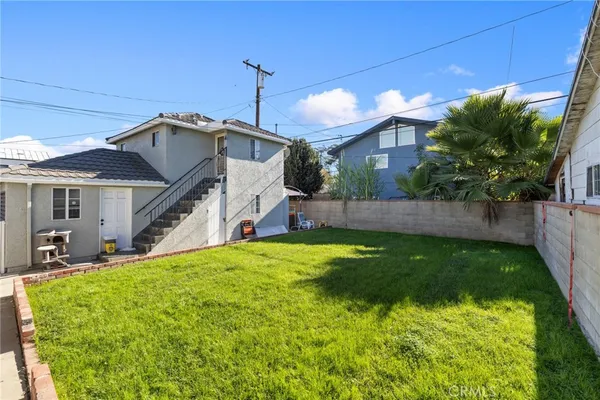 a house view with a garden space